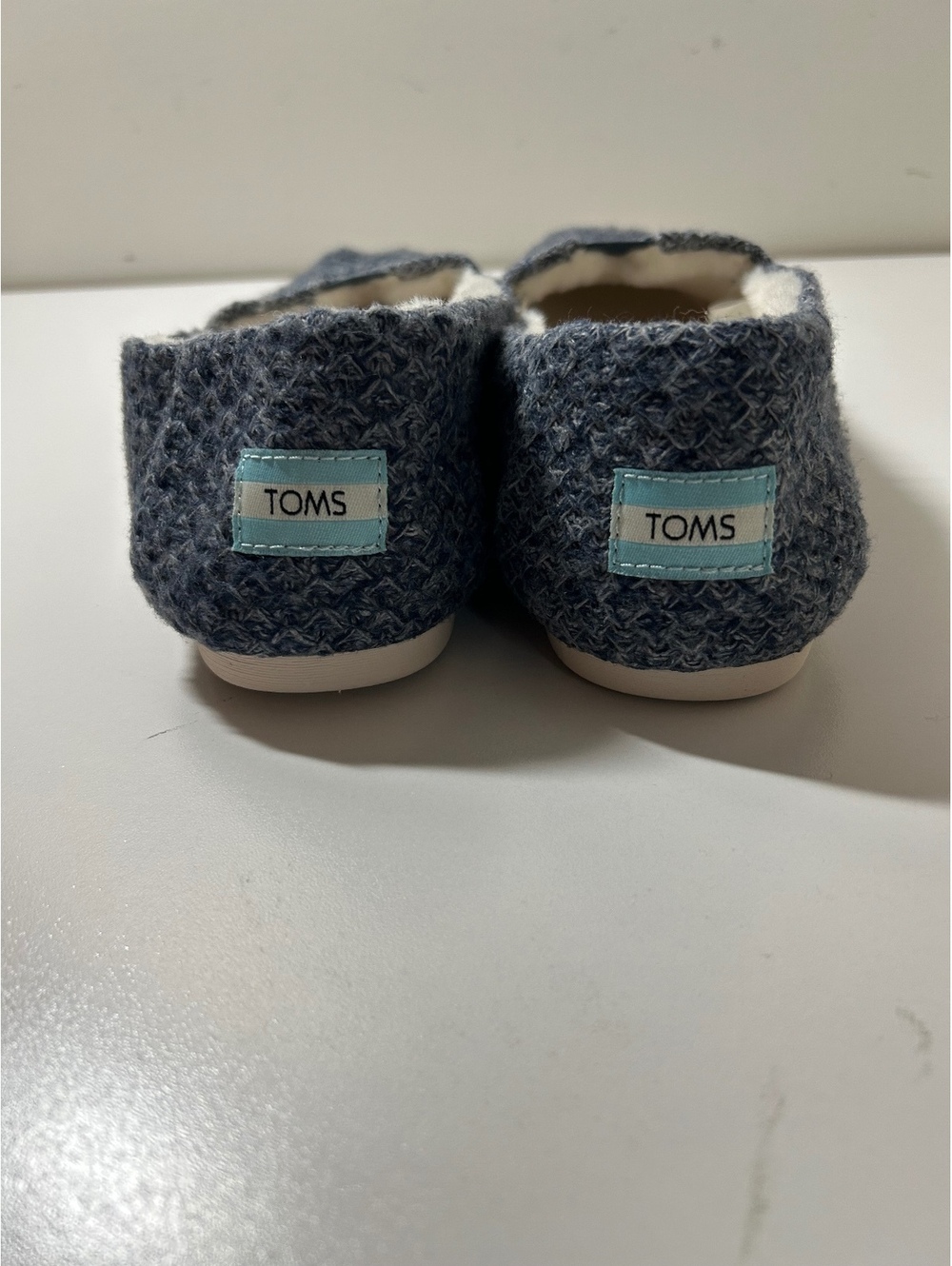 Tom’s slip ons